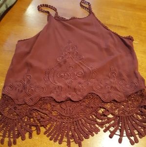 Burgundy tank top with lace bottom embellishment